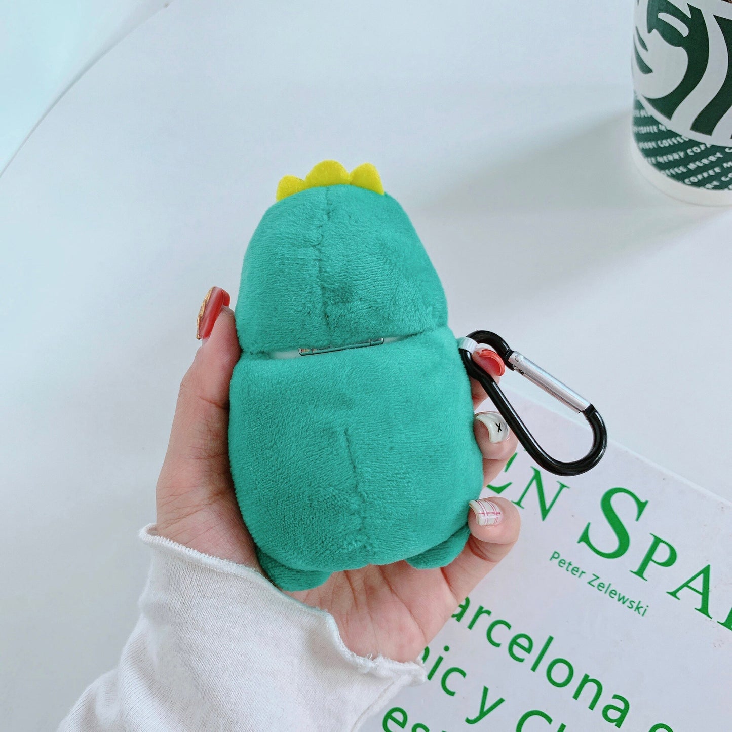 Plush dinosaur bluetooth headset case