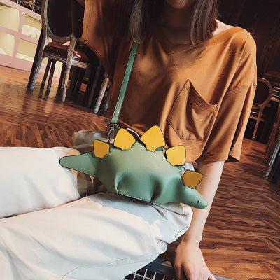 Female dinosaur shoulder bag