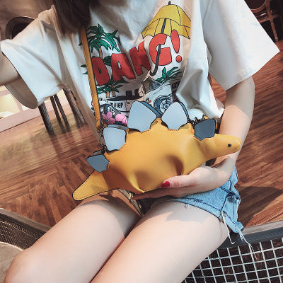 Female dinosaur shoulder bag